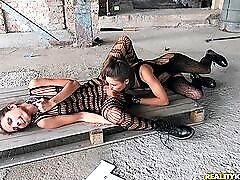 Body stocking beauties eat pussy in an abandoned building