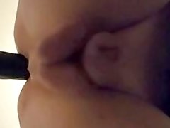Using the fuck machine to fuck her tranny ass