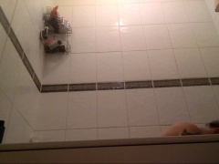 Cute teen with a fabulous ass takes a shower on hidden cam