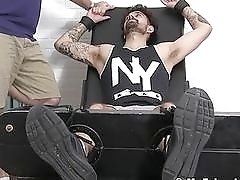 Tattoo jock Casey has feet torment in softcore bondage