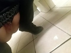 Naughty piss all over the floor in a busy public restroom